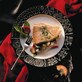 Pepper Seared Yellow Fin Tuna Filled With Virginia Goats Cheese, Sundried Tomatoes, Shiitake Mushrooms, Fresh Basil And Garlic 