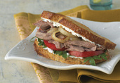 Pulled Lamb Sandwiches with Goat Cheese, Arugula and Caramelized Onions