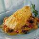 Saffron-infused Sea Bass with California Raisins, Butter Beans and Garlic