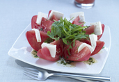 Arugula and Mozarella Spiked Florida Tomatoes with Basil Vinaigrette