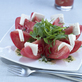 Arugula and Mozarella Spiked Florida Tomatoes with Basil Vinaigrette