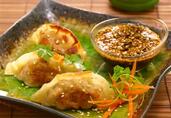 Crispy Pork and Shiitake Mushroom Dumplings with Toasted Sesame Dipping Sauce