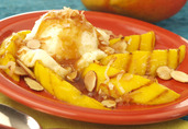 Grilled Mango with Spicy Rum Glaze and Vanilla Ice Cream