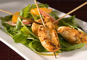 Tunisian Spiced Chicken Skewers with Pomegranate Dressing, Dates, and Apples