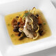 Wild Striped Sea Bass Roasted with Fennel, Sweet Onion, Heirloom Tomatoes and California Golden Raisins